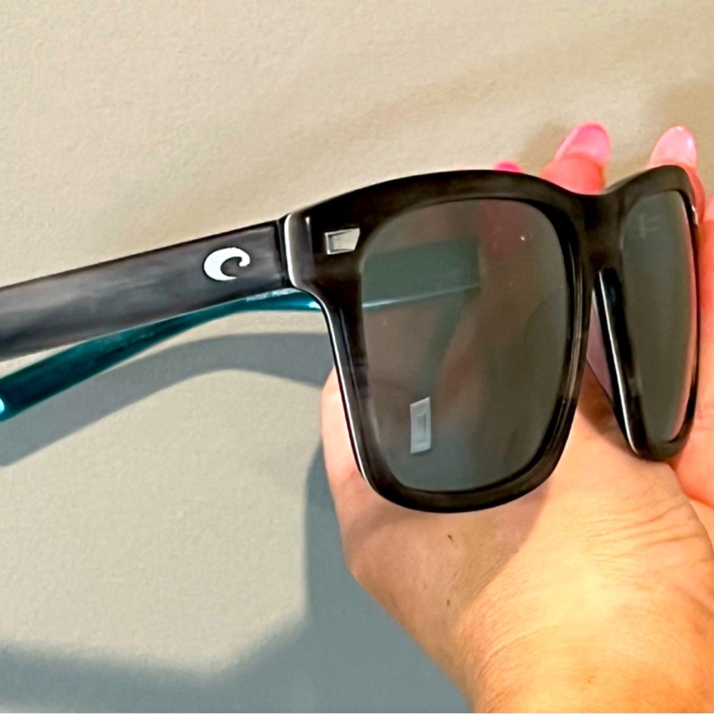 Costa Black Frame Sunglasses with Teal Temples